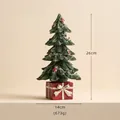 26cm decorative resin Christmas tree on a red gift box base with silver bow details - Small Christmas Tree