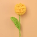 Detailed view of yellow hand-knitted tulip with soft yarn texture and green stem - Dark Yellow