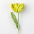 Detail of handcrafted crochet tulip featuring yellow petals and green knitted stem - Open Tulip Stem / Green