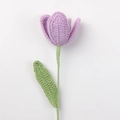 Detailed view of hand-knitted purple tulip petals and green stem with crochet texture - Open Tulip / Purple