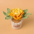 Macro detail of handmade crochet yellow peony flower in a beige knitted pot - Gradient Yellow Peony (Large Cylindrical Yarn Pot)