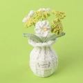 Detail of handmade crochet forget-me-not potted plant with HandMade WITH LOVE label - Forget-me-not White Vase - Gradient Green