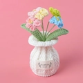 Detail of handmade crochet sunflower potted plant with HandMade WITH LOVE label - Forget-me-not White Vase - Multicolor