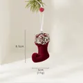 Flocked burgundy Christmas stocking ornament with gold sequins on festive pine branch - Christmas Boot Style (BN252325)