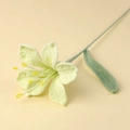 Detailed macro view of handmade crochet lily flower with realistic knit texture - Light Yellow