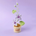 Handmade crochet purple flower potted plant with heart leaves and handmade leather label - Purple