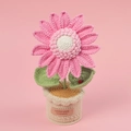 Macro detail of handmade crochet pink sunflower in beige pot with a tiny red ladybug - Pink Ladybug Sunflower Potted Plant (Large Cylindrical Pot)