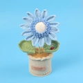Close-up of handmade crochet sunflower pot with ladybug detail and handmade leather label - Blue Ladybug Sunflower Potted Plant (Large Cylindrical Pot)