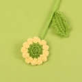 Handmade crochet sunflower with yellow petals and green stem on a matching background - Finished Small Daisy Bouquet (Green Center/Yellow Edge)