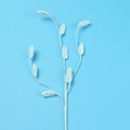 Handmade crochet grass stem with mint green leaves on a solid blue background - Blue