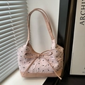 Pink jacquard tote bag with black mini bow patterns and a large decorative ribbon bow - Pink