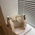 Beige nylon tote bag with small round coin purse and adjustable wide fabric strap - White