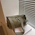 Olive green nylon cylinder crossbody bag with wide strap and detachable coin purse - Green