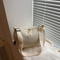 Minimalist beige nylon crossbody bag with adjustable wide strap and fanyissa tag - White