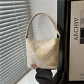 Elegant floral jacquard bucket bag in beige and yellow with a vintage texture - Beige