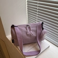 Lichtpaarse nylon crossbody-draagtas met bijpassende ronde muntzak en geweven riem - Paars