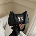 Chic black half-moon underarm bag for women with a silver metal bow accent - Black