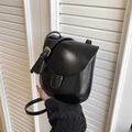 Glossy black saddle bag for women with gold buckle and adjustable strap - Black