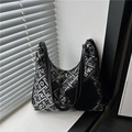 Bolso de hombro chic en jacquard negro con bordado floral en el alféizar - Negro