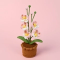 Handmade crochet potted plant with pink flowers and green leaves in a brown pot - Pink Butterfly Orchid Potted Plant