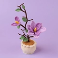 Handgefertigte lila Häkel-Topfpflanze Dekoration mit gestrickten Blumen für Zuhause - Lila - Magnolie (Wollener zylindrischer Topf)
