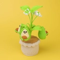 Handmade crochet avocado potted plant ornament with cute smiling faces on yellow background - Avocado Potted Plant