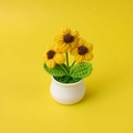 Detail of hand-crocheted sunflowers in a white ceramic pot with green leaves - 3-Head Dark Yellow Small Flower Potted Plant