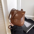 Classic brown vintage saddle shoulder bag made of soft synthetic leather with flap cover - Brown