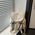 Minimalistische beige nylon rugzak met zwarte strikken en Nika-borduurwerk voor dames - Wit