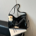 Glossy black motorcycle tote bag with silver plaque and plush bear keychain charm - Single Bag / Black