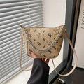 Minimalist beige bucket bag with cartoon bear print and silver metal chain strap - Khaki