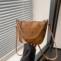 Vintage brown bucket bag with bear patterns and silver chain detail for summer - Brown