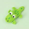 Handgefertigte grüne Häkel-Krokodil Haarspange für Kinder mit weicher Stricktextur - Hellgrün