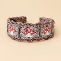Detail of handmade crochet hairband featuring mushroom embroidery and granny squares - Mushroom-Dark Coffee