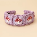 Detailed macro view of handmade purple crochet headband with red 3D mushroom embroidery - Mushroom Headband - Purple