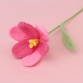 Detailed macro view of handmade crochet tulip with pink gradient yarn and yellow stamens - Open Tulip Stem / Gradient Rose Pink