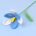 Macro detail of hand-knitted blue and white tulip with soft cotton yarn texture - Open Tulip Stem / Gradient Light Blue