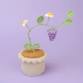 Handmade crochet potted plant with green leaves, white flowers and purple grape charms - Purple Grape Potted Plant