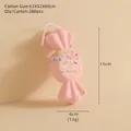 Addobbo natalizio a forma di caramella rosa con glitter e decorazioni colorate - Caramella