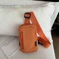 Bright orange waterproof nylon crossbody bag with adjustable strap and Fashion label - Orange