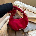 Magenta pleated crescent bag with bow shoulder strap and embroidery detail - Red