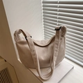 Minimalist beige corduroy crescent shoulder bag with adjustable strap for women - Off White