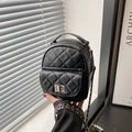 Mini zaino trapuntato nero da donna con catena argentata e chiusura a girello elegante - Nero