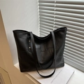 Black large capacity tote bag with crocodile texture and checkerboard stitching detail - Black