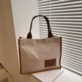 Bolso tote grande de pana beige con ribetes marrones y etiqueta de moda en piel - Blanco Roto
