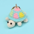 Handmade crochet turtle keychain with colorful patchwork shell and golden ring charm - Sky Blue