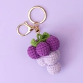 Macro detail of handmade crochet purple grape keychain with green leaves and gold metal clasp - Crocheted Gradient Purple Grape Keychain (lobster Clasp)