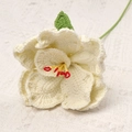Handmade crochet lily flower in off-white yarn with yellow stamens and green leaves - White