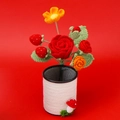 Detail of handmade crocheted red rose and strawberry bouquet in a black wire pen holder - Red Rose Style