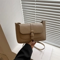 Khaki woven texture small square crossbody bag with buckle closure on natural background - Khaki